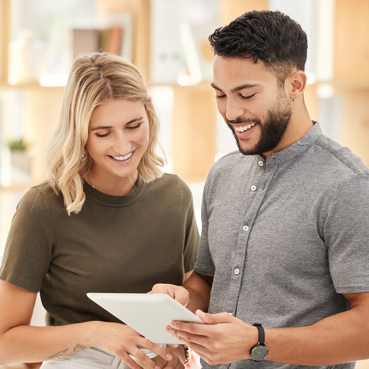 agents-reviewing-content-on-tablet Agents reviewing content on a tablet