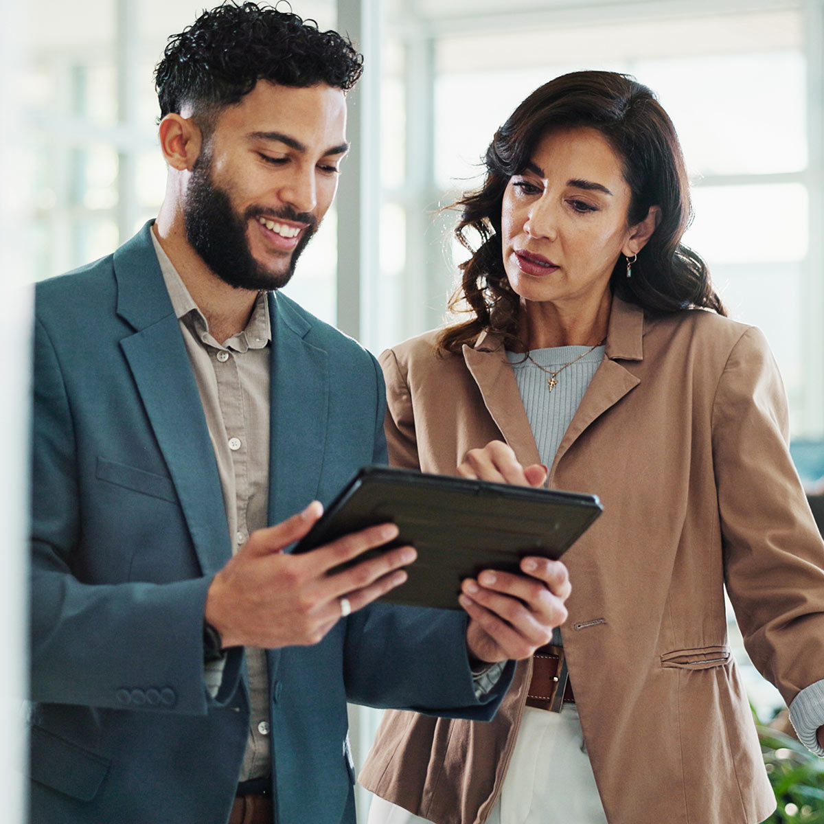 employees-reviewing-data-reversed Employee Viewing Data