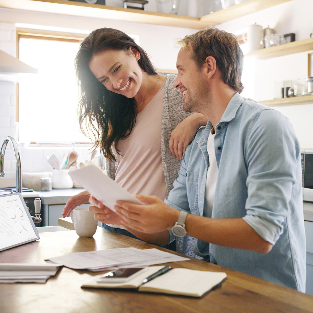 Young Couple Reviewing Paperwork