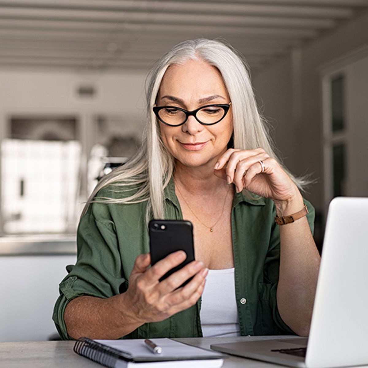 Agents reviewing content on a tablet